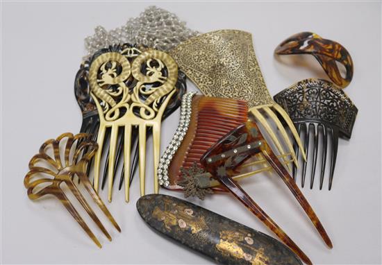 A fan, fan case, hair combs etc